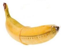 banane dans un préservatif imite une bite agrandie
